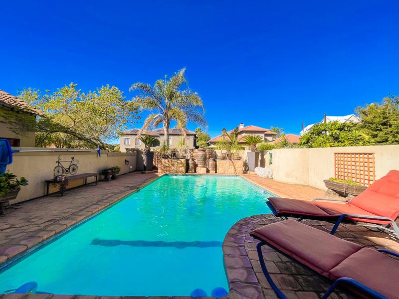 Discover Your Dream Family Home in Midstream Estate!