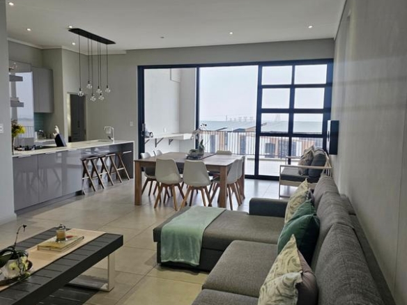 With the exquisite “Dapper in Grey” design, this Penthouse luxury apartment is perfect for those who appreciate contemporary elegance and functional luxury..