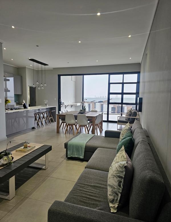 With the exquisite “Dapper in Grey” design, this Penthouse luxury apartment is perfect for those who appreciate contemporary elegance and functional luxury..