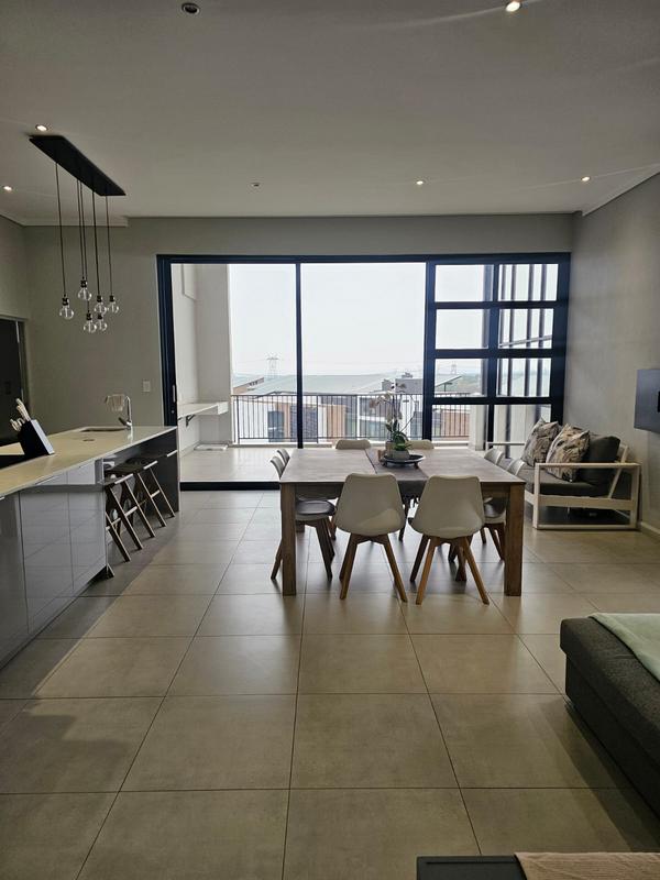 With the exquisite “Dapper in Grey” design, this Penthouse luxury apartment is perfect for those who appreciate contemporary elegance and functional luxury..