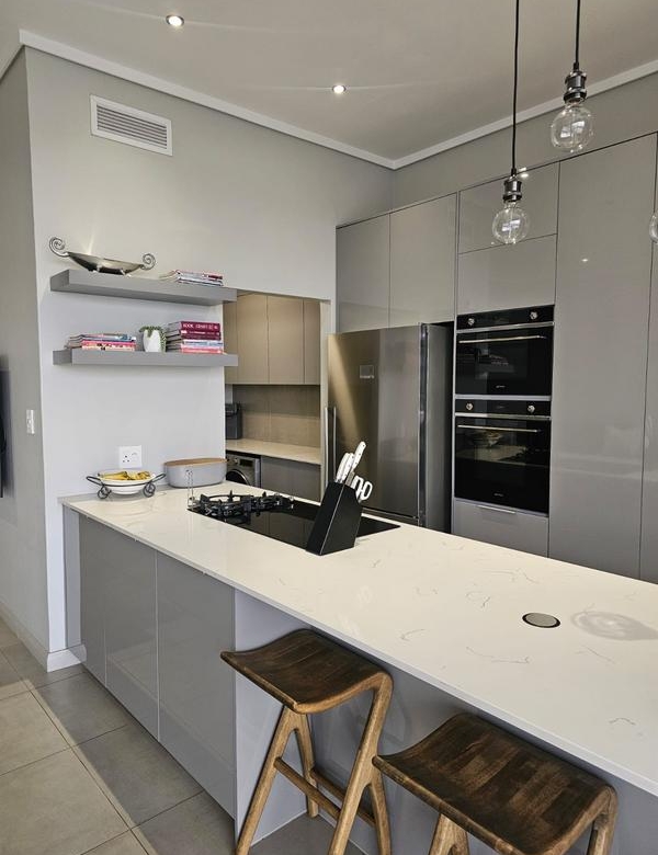 With the exquisite “Dapper in Grey” design, this Penthouse luxury apartment is perfect for those who appreciate contemporary elegance and functional luxury..