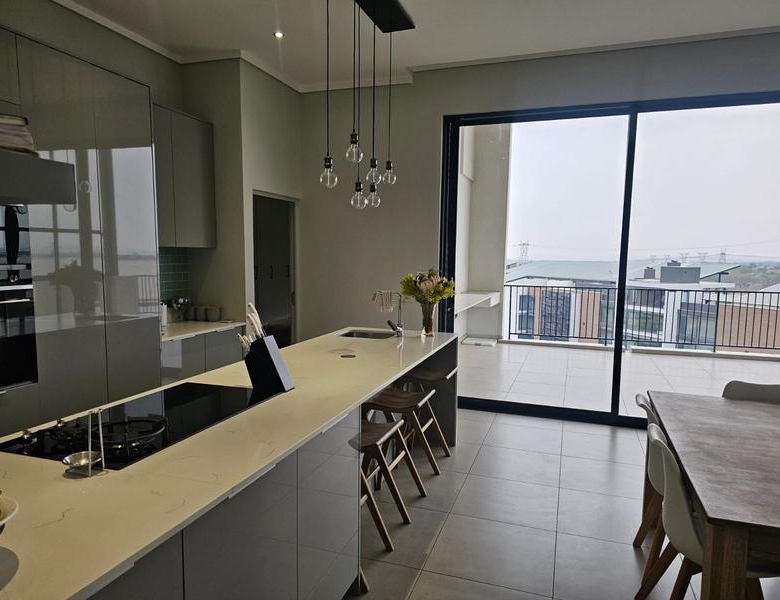 With the exquisite “Dapper in Grey” design, this Penthouse luxury apartment is perfect for those who appreciate contemporary elegance and functional luxury..
