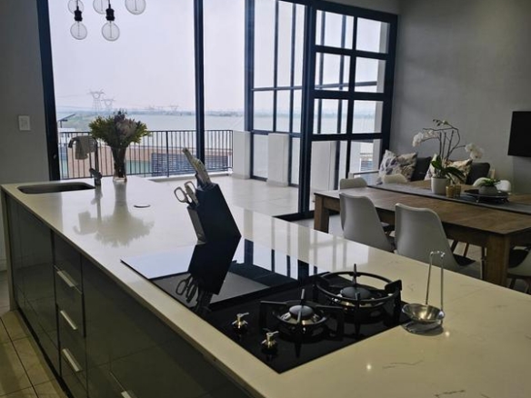 With the exquisite “Dapper in Grey” design, this Penthouse luxury apartment is perfect for those who appreciate contemporary elegance and functional luxury..