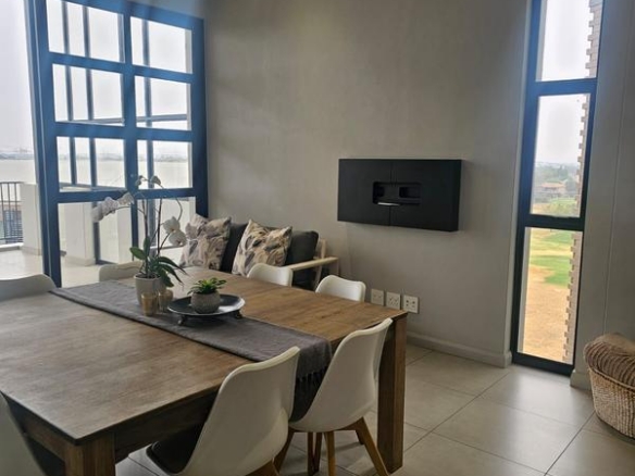 With the exquisite “Dapper in Grey” design, this Penthouse luxury apartment is perfect for those who appreciate contemporary elegance and functional luxury..