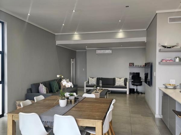 With the exquisite “Dapper in Grey” design, this Penthouse luxury apartment is perfect for those who appreciate contemporary elegance and functional luxury..