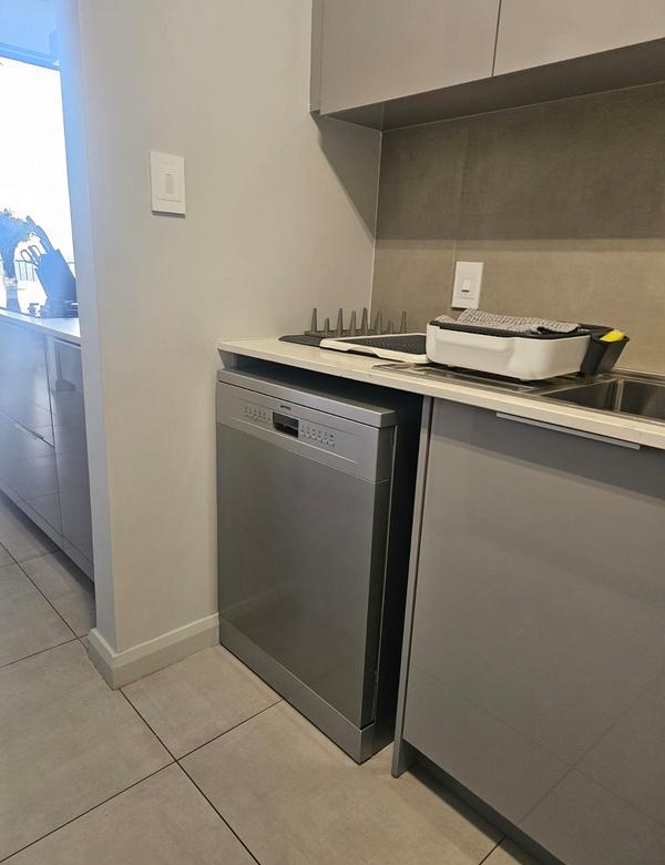 With the exquisite “Dapper in Grey” design, this Penthouse luxury apartment is perfect for those who appreciate contemporary elegance and functional luxury..