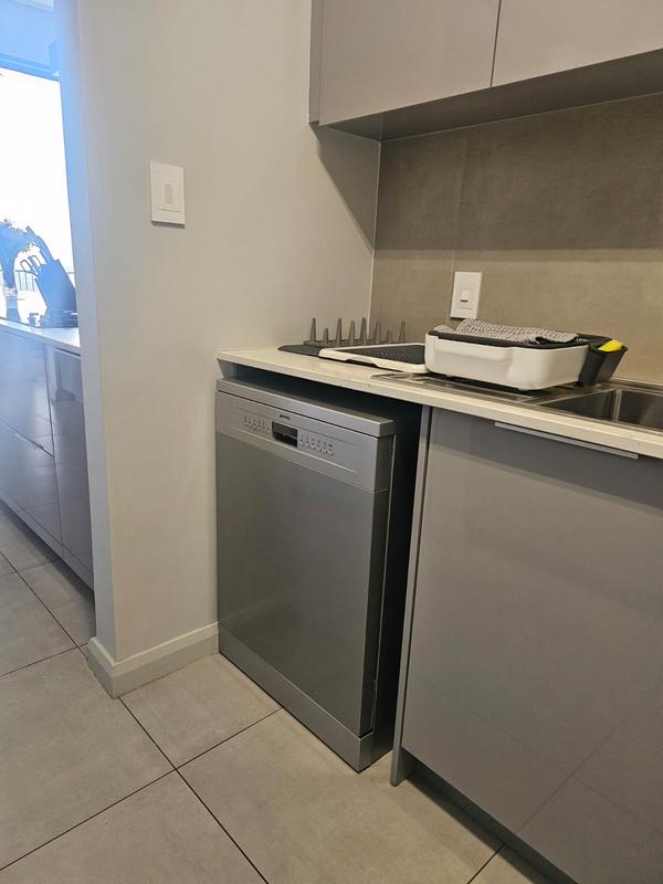 With the exquisite “Dapper in Grey” design, this Penthouse luxury apartment is perfect for those who appreciate contemporary elegance and functional luxury..