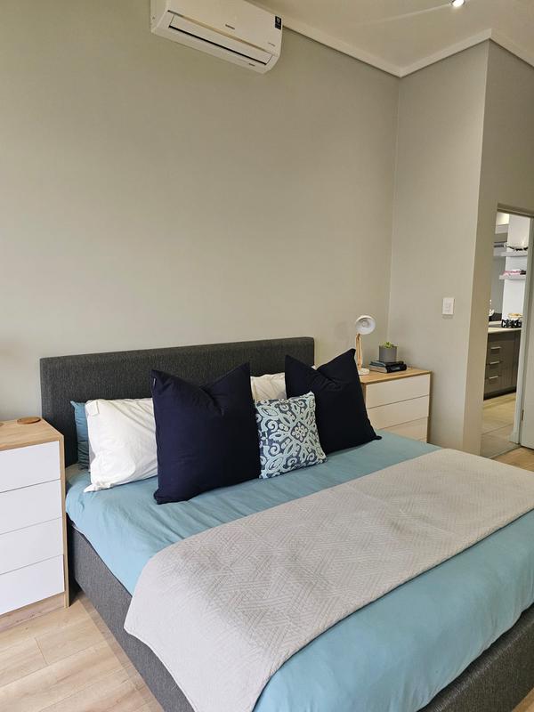 With the exquisite “Dapper in Grey” design, this Penthouse luxury apartment is perfect for those who appreciate contemporary elegance and functional luxury..