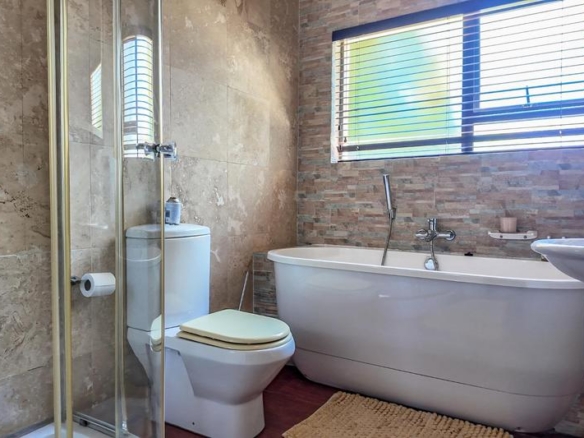 Grand 5‑Bedroom Home with Exceptional Space, Walking Distance to the School