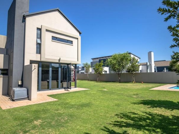 Modern Industrial Masterpiece in Midstream Meadows Estate