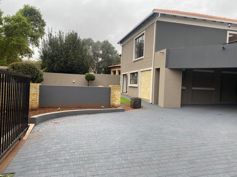 This expansive 690 sqm modern home is expertly designed with dual living in mind.  The separate wing caters for adult children or extended family with total privacy and a separate living with ample undercover parking for the entire family.