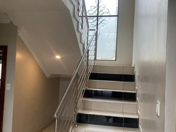 This expansive 690 sqm modern home is expertly designed with dual living in mind.  The separate wing caters for adult children or extended family with total privacy and a separate living with ample undercover parking for the entire family.
