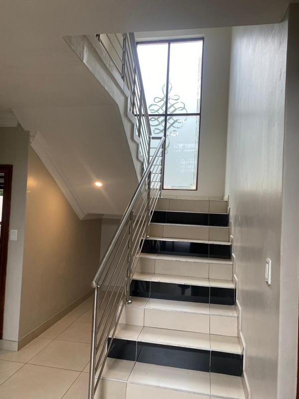 This expansive 690 sqm modern home is expertly designed with dual living in mind.  The separate wing caters for adult children or extended family with total privacy and a separate living with ample undercover parking for the entire family.