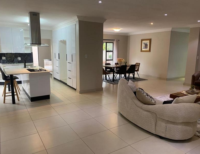 This expansive 690 sqm modern home is expertly designed with dual living in mind.  The separate wing caters for adult children or extended family with total privacy and a separate living with ample undercover parking for the entire family.