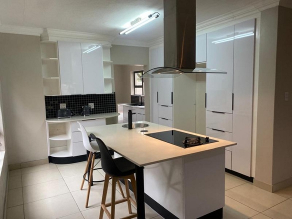 This expansive 690 sqm modern home is expertly designed with dual living in mind.  The separate wing caters for adult children or extended family with total privacy and a separate living with ample undercover parking for the entire family.