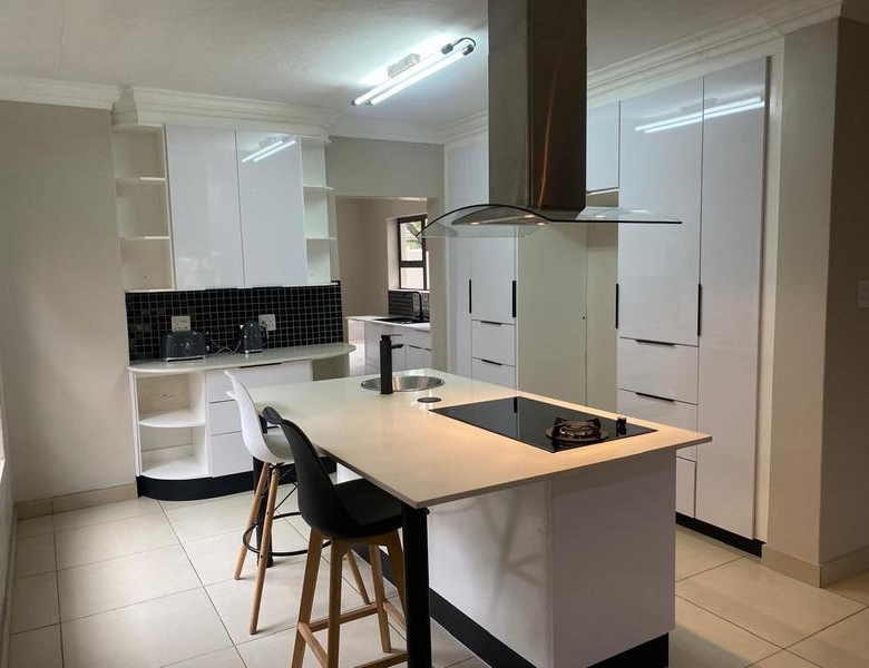 This expansive 690 sqm modern home is expertly designed with dual living in mind.  The separate wing caters for adult children or extended family with total privacy and a separate living with ample undercover parking for the entire family.