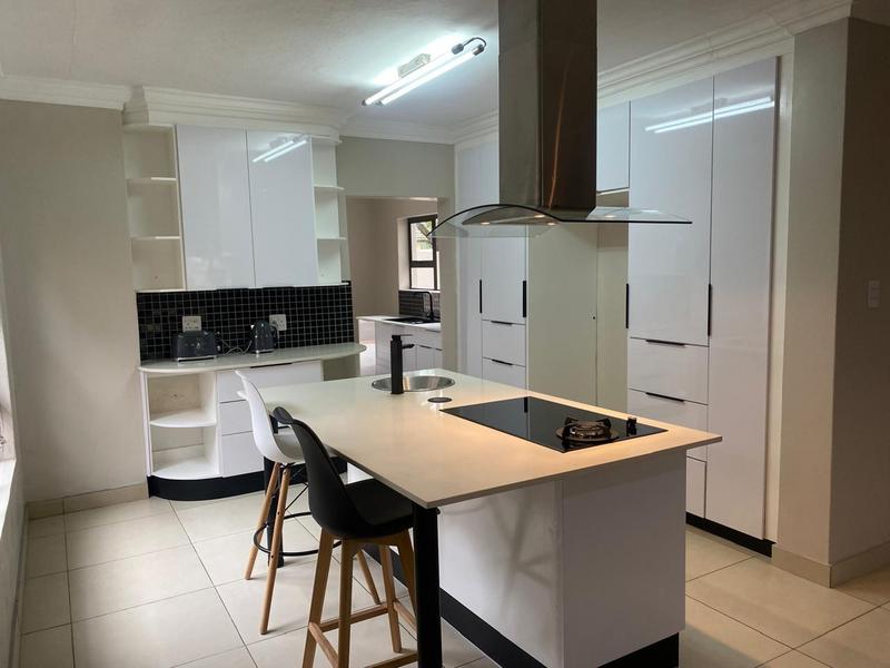 This expansive 690 sqm modern home is expertly designed with dual living in mind.  The separate wing caters for adult children or extended family with total privacy and a separate living with ample undercover parking for the entire family.