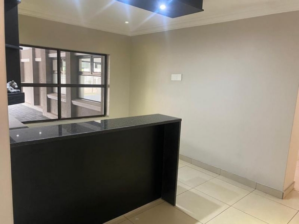This expansive 690 sqm modern home is expertly designed with dual living in mind.  The separate wing caters for adult children or extended family with total privacy and a separate living with ample undercover parking for the entire family.