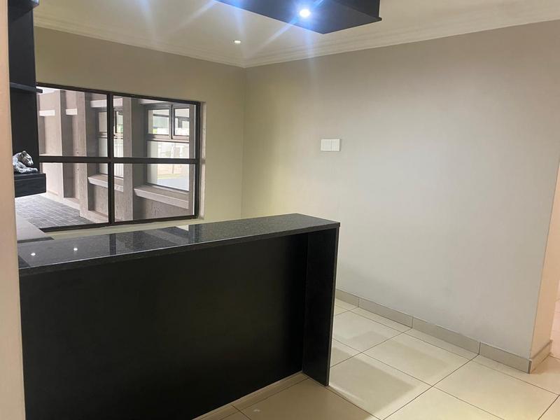 This expansive 690 sqm modern home is expertly designed with dual living in mind.  The separate wing caters for adult children or extended family with total privacy and a separate living with ample undercover parking for the entire family.