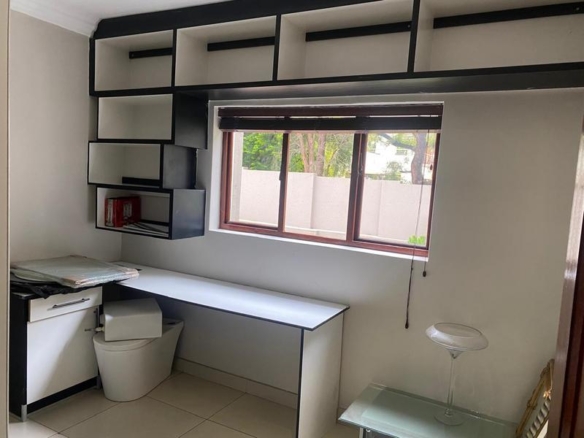 This expansive 690 sqm modern home is expertly designed with dual living in mind.  The separate wing caters for adult children or extended family with total privacy and a separate living with ample undercover parking for the entire family.