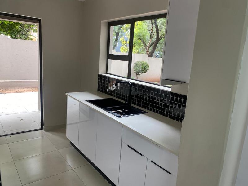 This expansive 690 sqm modern home is expertly designed with dual living in mind.  The separate wing caters for adult children or extended family with total privacy and a separate living with ample undercover parking for the entire family.