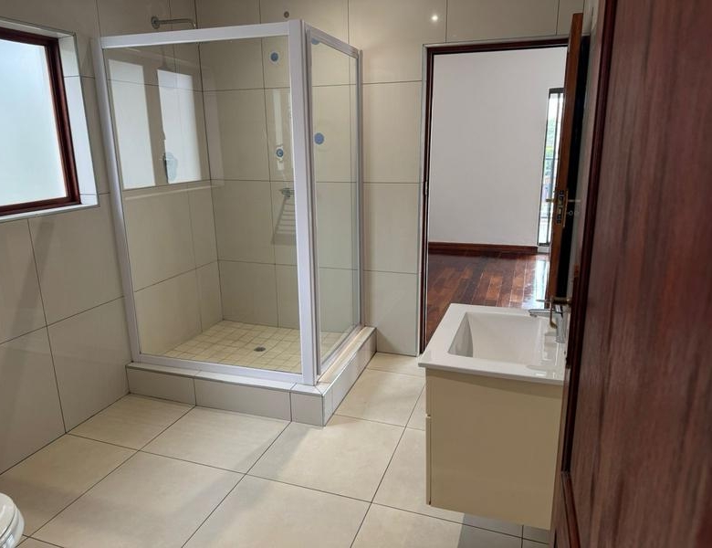 This expansive 690 sqm modern home is expertly designed with dual living in mind.  The separate wing caters for adult children or extended family with total privacy and a separate living with ample undercover parking for the entire family.