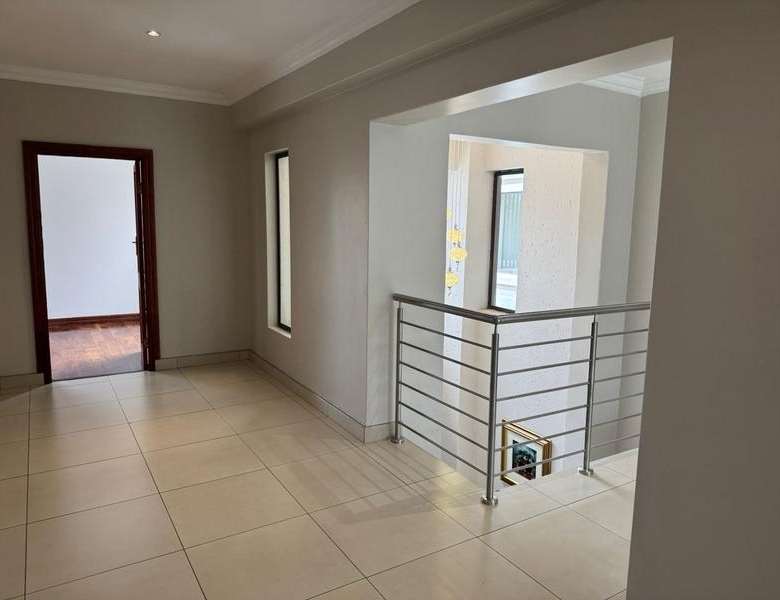 This expansive 690 sqm modern home is expertly designed with dual living in mind.  The separate wing caters for adult children or extended family with total privacy and a separate living with ample undercover parking for the entire family.