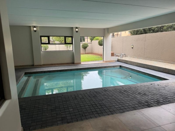 This expansive 690 sqm modern home is expertly designed with dual living in mind.  The separate wing caters for adult children or extended family with total privacy and a separate living with ample undercover parking for the entire family.