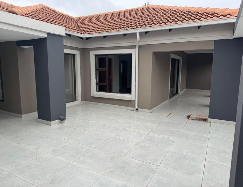 This expansive 690 sqm modern home is expertly designed with dual living in mind.  The separate wing caters for adult children or extended family with total privacy and a separate living with ample undercover parking for the entire family.