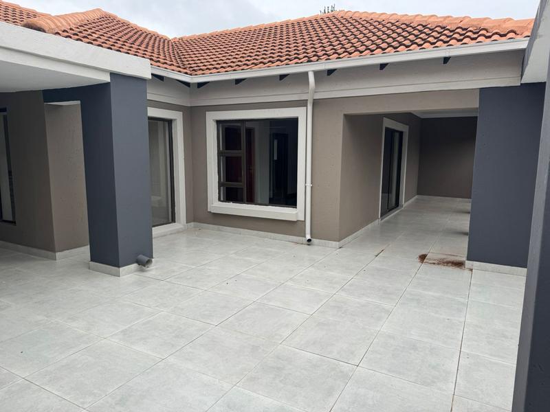 This expansive 690 sqm modern home is expertly designed with dual living in mind.  The separate wing caters for adult children or extended family with total privacy and a separate living with ample undercover parking for the entire family.