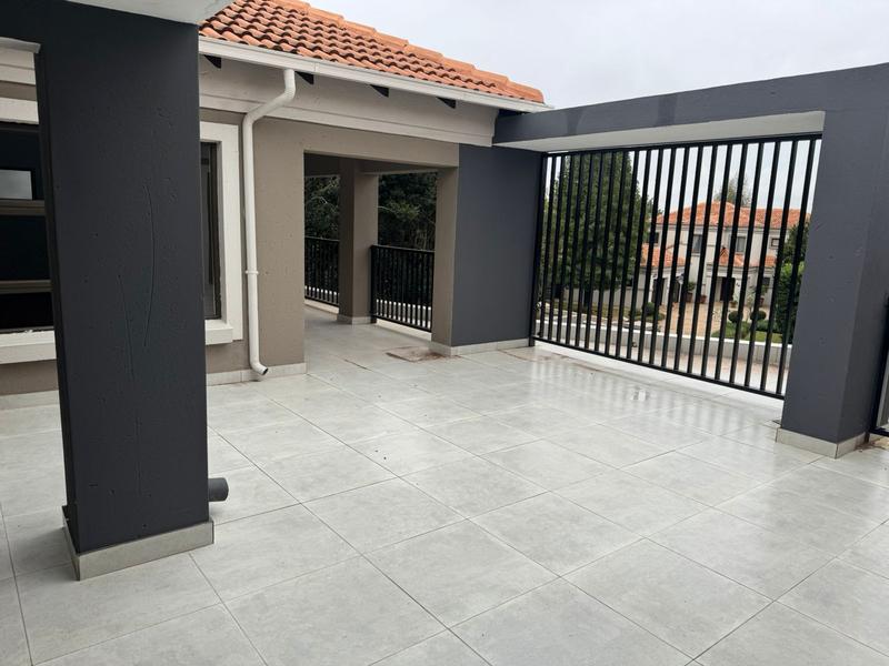 This expansive 690 sqm modern home is expertly designed with dual living in mind. The separate wing caters for adult children or extended family with total privacy and a separate living with ample undercover parking for the entire family.