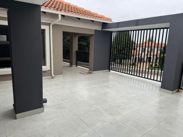 This expansive 690 sqm modern home is expertly designed with dual living in mind.  The separate wing caters for adult children or extended family with total privacy and a separate living with ample undercover parking for the entire family.