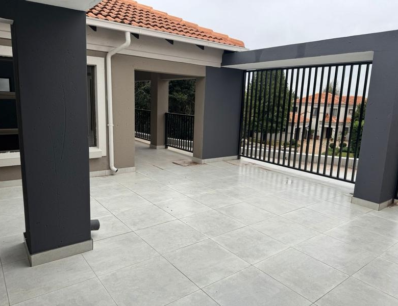 This expansive 690 sqm modern home is expertly designed with dual living in mind.  The separate wing caters for adult children or extended family with total privacy and a separate living with ample undercover parking for the entire family.