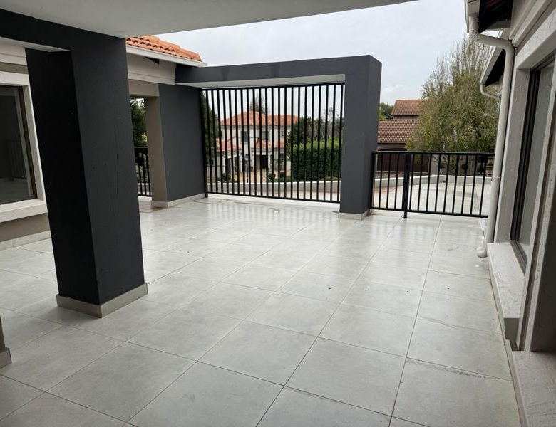 This expansive 690 sqm modern home is expertly designed with dual living in mind.  The separate wing caters for adult children or extended family with total privacy and a separate living with ample undercover parking for the entire family.