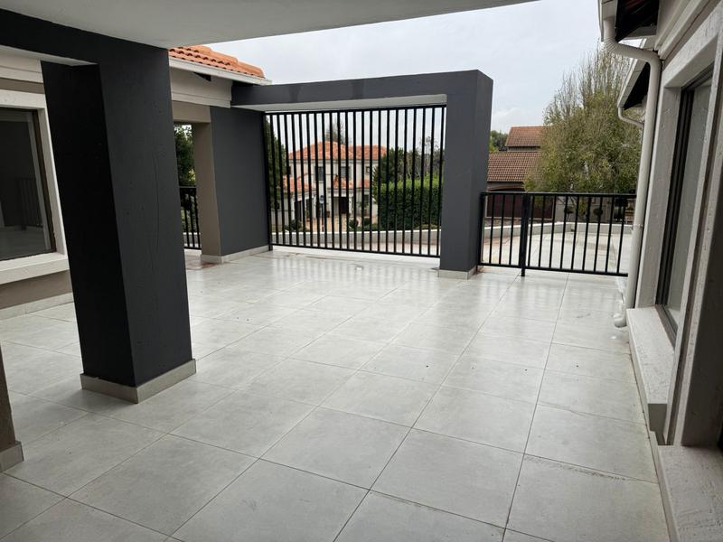 This expansive 690 sqm modern home is expertly designed with dual living in mind.  The separate wing caters for adult children or extended family with total privacy and a separate living with ample undercover parking for the entire family.
