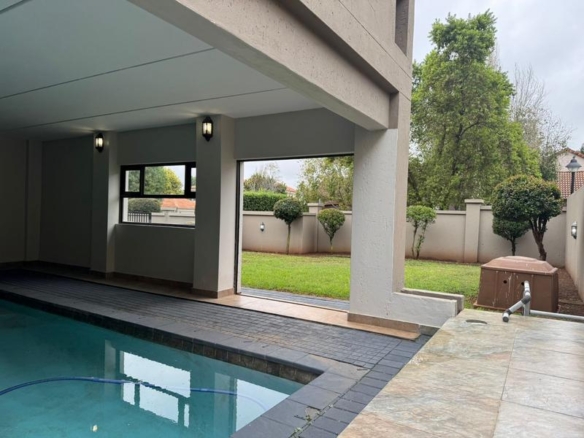 This expansive 690 sqm modern home is expertly designed with dual living in mind.  The separate wing caters for adult children or extended family with total privacy and a separate living with ample undercover parking for the entire family.