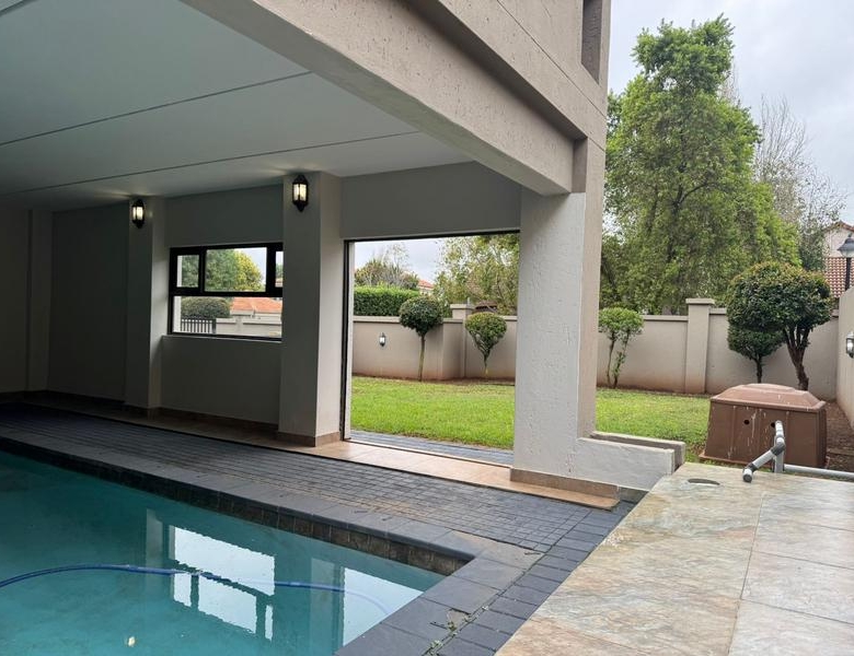 This expansive 690 sqm modern home is expertly designed with dual living in mind.  The separate wing caters for adult children or extended family with total privacy and a separate living with ample undercover parking for the entire family.