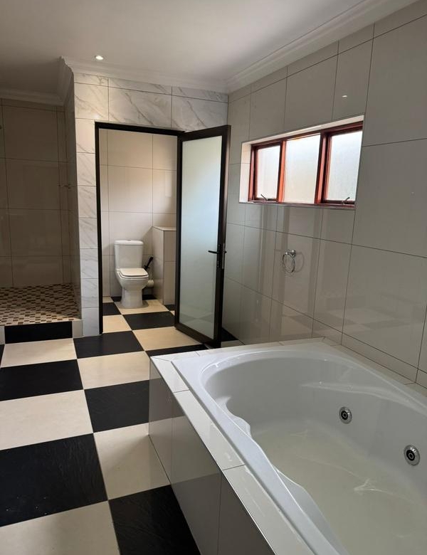 This expansive 690 sqm modern home is expertly designed with dual living in mind.  The separate wing caters for adult children or extended family with total privacy and a separate living with ample undercover parking for the entire family.