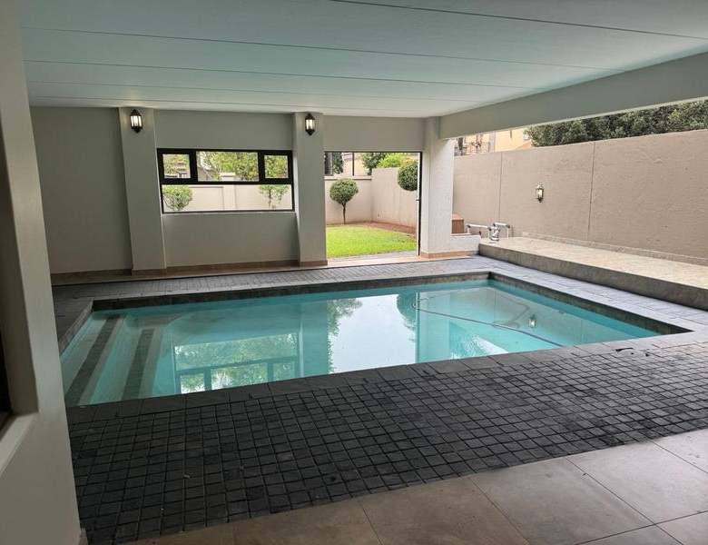 This expansive 690 sqm modern home is expertly designed with dual living in mind.  The separate wing caters for adult children or extended family with total privacy and a separate living with ample undercover parking for the entire family.