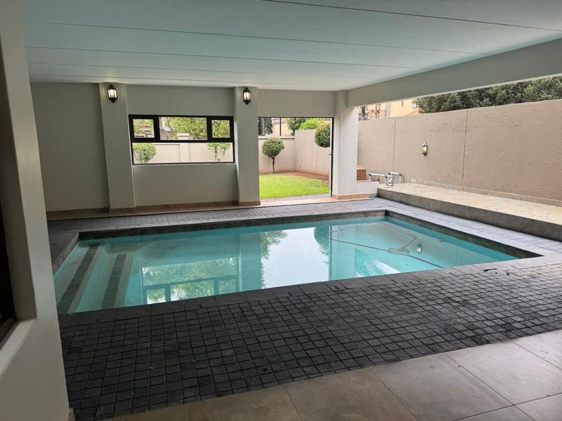 This expansive 690 sqm modern home is expertly designed with dual living in mind.  The separate wing caters for adult children or extended family with total privacy and a separate living with ample undercover parking for the entire family.