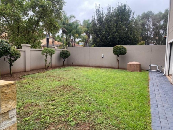 This expansive 690 sqm modern home is expertly designed with dual living in mind.  The separate wing caters for adult children or extended family with total privacy and a separate living with ample undercover parking for the entire family.