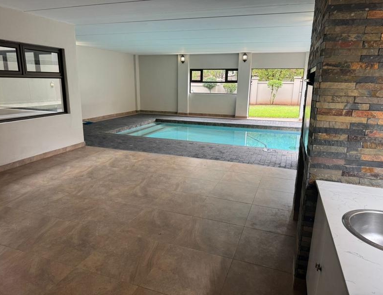 This expansive 690 sqm modern home is expertly designed with dual living in mind.  The separate wing caters for adult children or extended family with total privacy and a separate living with ample undercover parking for the entire family.