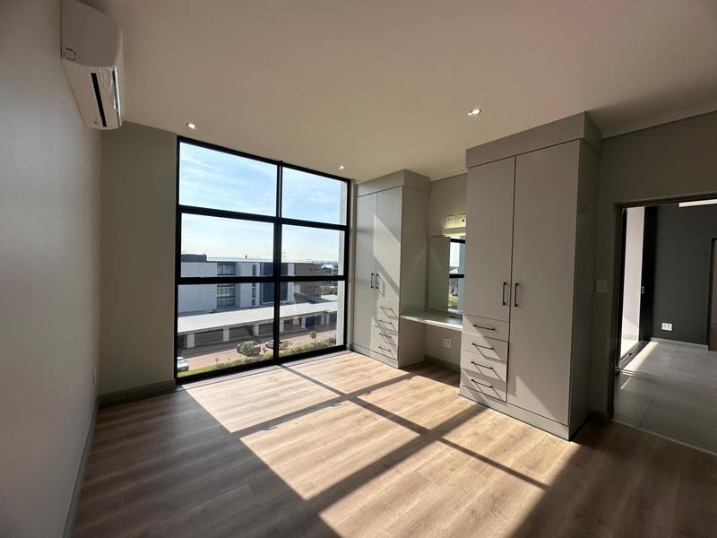 Step into a world where modern luxury meets effortless comfort in this brand-new Block G apartment at Ascend to Midstream.