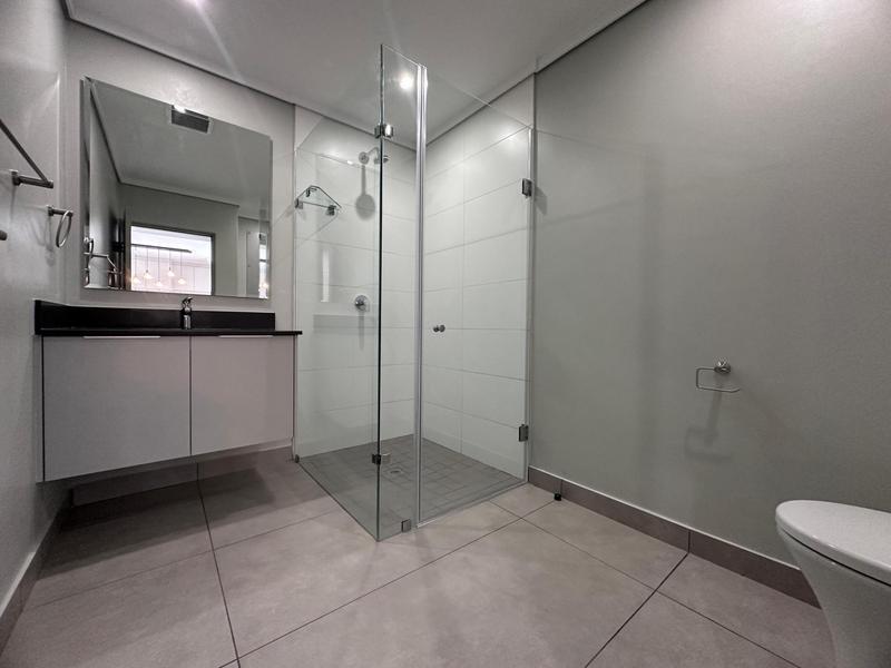 Step into a world where modern luxury meets effortless comfort in this brand-new Block G apartment at Ascend to Midstream.