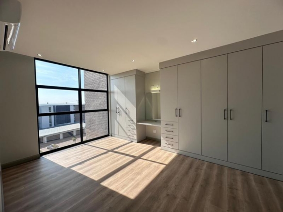 Step into a world where modern luxury meets effortless comfort in this brand-new Block G apartment at Ascend to Midstream.