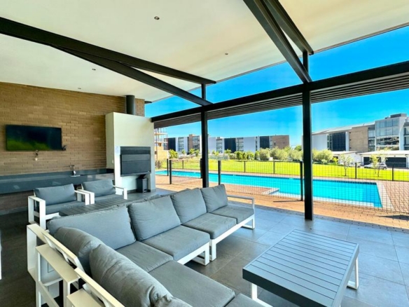 Step into a world where modern luxury meets effortless comfort in this brand-new Block G apartment at Ascend to Midstream.