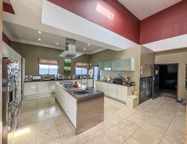 Large family home with exceptional design in the heart of Old Midstream.  Walking distance to school.