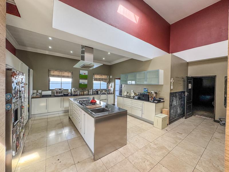 Large family home with exceptional design in the heart of Old Midstream. Walking distance to school.