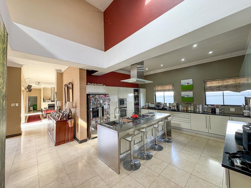 Large family home with exceptional design in the heart of Old Midstream. Walking distance to school.