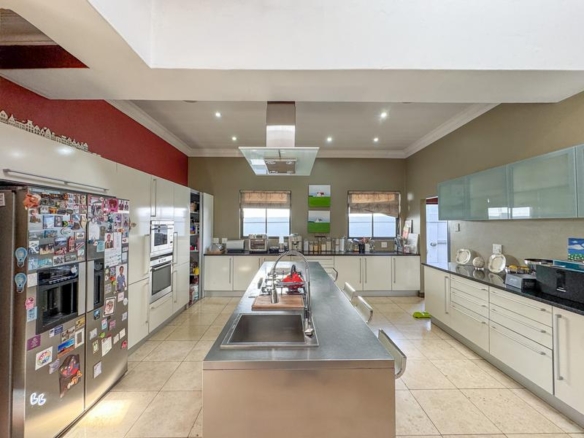Large family home with exceptional design in the heart of Old Midstream.  Walking distance to school.